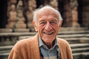 Portrait of a smiling senior man at the temple in Hampi