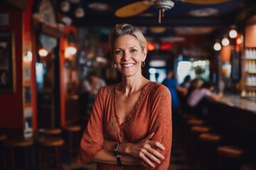 Obraz premium Medium shot portrait photography of a cheerful woman in her 40s that is wearing a chic cardigan against a lively flamenco performance in a spanish taverna background . Generative AI