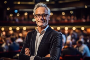Medium shot portrait photography of a pleased man in his 50s that is wearing a chic cardigan against a beautiful symphony orchestra performance in a concert hall background .  Generative AI