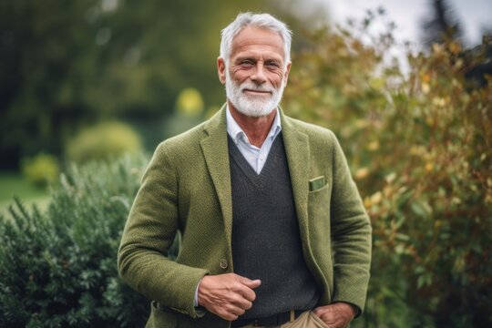 Medium shot portrait photography of a satisfied man in his 60s that is wearing a chic cardigan against a garden or botanical background .  Generative AI