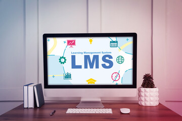 Learning Management System. Computer monitor with different icons and abbreviation LMS on screen. Workplace with modern device, notebooks and houseplant