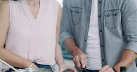 Happy couple, cooking together with vegetables in kitchen and ingredients for healthy food, nutrition and diet. Cutting vegetable, man helping woman with meal prep and vegan dinner in home with smile