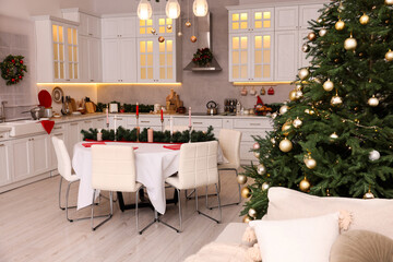 Cozy spacious kitchen decorated for Christmas. Interior design