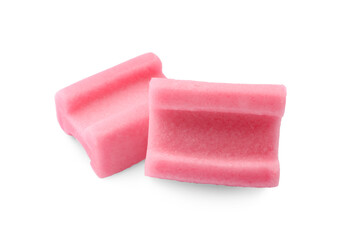 Tasty pink chewing gums on white background