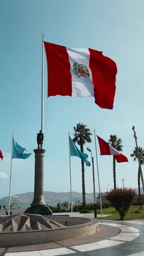 Peruvian Flag and Callao Municipal Flag Flying High in Unison