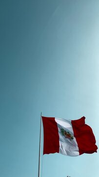 Peruvian Flag and Callao Municipal Flag Flying High in Unison