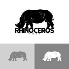 RHINOS THAT ARE EATING