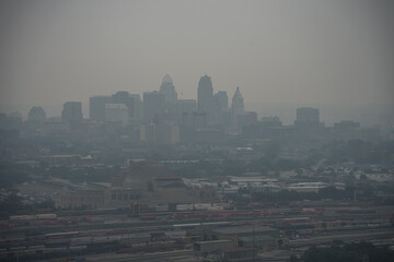Smog in Cincinnati, skyline cityscape, Ohio. Fire smog from Canada in Ohio. - 610834253