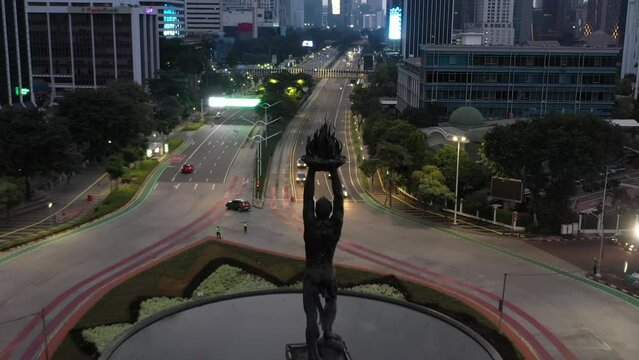 Aerial drone footage of the highway within the central city of Jakarta Indonesia at night