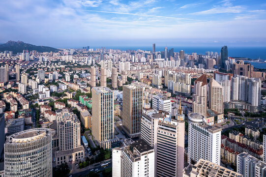 Aerial photo of urban landscape in Qingdao coastal bay area © 昊 周