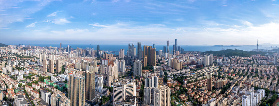 Aerial photo of urban landscape in Qingdao coastal bay area © 昊 周