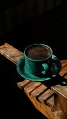 a cup of coffee in the morning good light sun and beautiful shadow