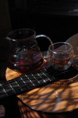 Manual brewing coffee pour over in my coffee shop and now closed. with some good light and beautiful shadow frame plant on wood table