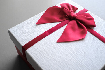  Valentine present. Gift box and red ribbon for romantic couple.