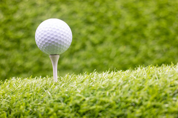 Golf ball on tee ready for tee off 