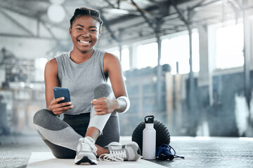 Social media, smile or black woman with phone in gym to search for sports online in training or exercise. Fitness app, happy or healthy athlete relaxing or resting online mobile content on break