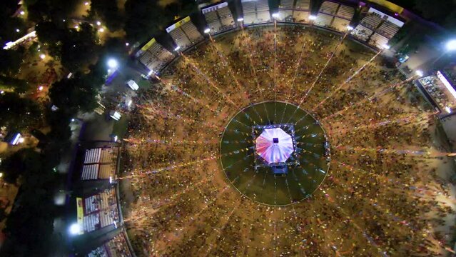 FPV Drone shot of Navratri festival. Navratri is an Indian Festival and It spans over nine nights. crowd in round shape