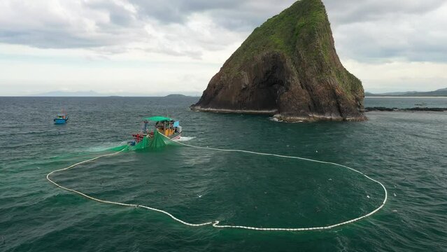 Ships are releasing fishing nets on Yen Island, Phu Yen, Vietnam