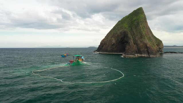 Ships are releasing fishing nets on Yen Island, Phu Yen, Vietnam