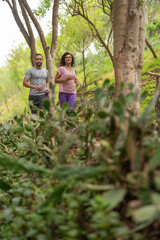 Naklejka na ściany i meble Boyfriend and girlfriend running together