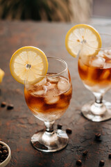 Espresso tonic beverage with coffee. Summer cold iced drink with ice still life photo