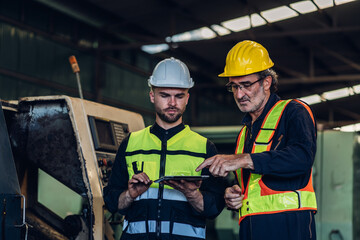 Workers Factory or Engineering work at factory site check up machine or products in site. Foreman...