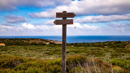 signpost on the hill