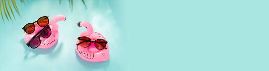 Summer sunglasses and glasses special offer, sale banner. Trendy sunglass on inflatable flamingo on...