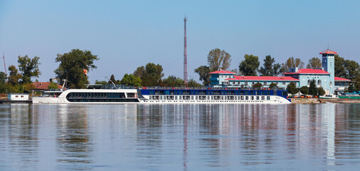 Fototapeta na wymiar Giurgiu port, panoramic photo on a sunny day. Coast of Danube River