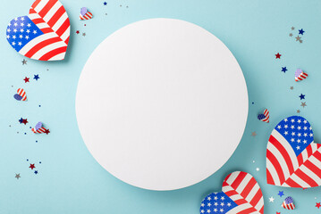 Obraz premium USA Independence Day revelries. Top view of iconic embellishments: hearts featuring national flag motif, confetti, arranged on light blue surface with empty circle perfect for text or promo content