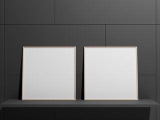 Hanging empty blank frame leaning against the wall