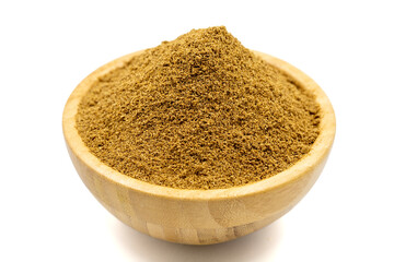 Coriander powder isolated on white background. Powdered dried Coriander in wooden bowl. Close up