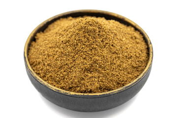 Coriander powder isolated on white background. Powdered dried Coriander in bowl