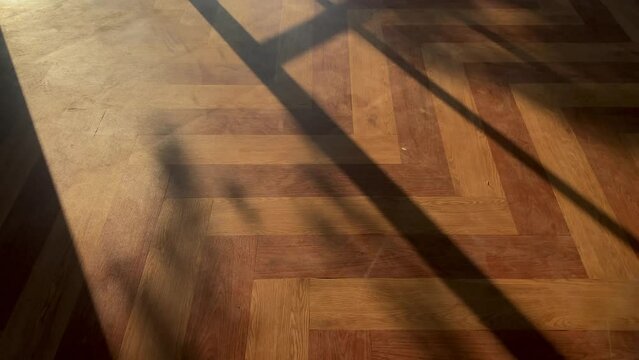 door shadow under sunset, modern open air shadow design, showing on parquet floor
