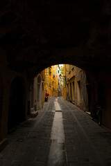 Narrow Street and Tunnel in Old Town in Menton, Provence-Alpes-Côte d´Azur, France.