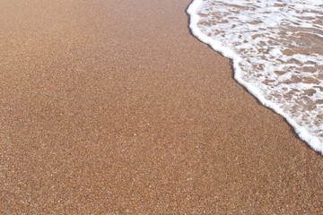 Sand and sea wave. Summer beach