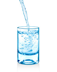 clear water being poured into a glass cup isolated on white background