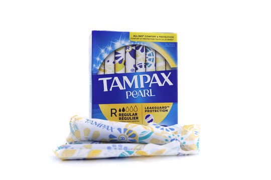 Magdalinovka, Ukraine - June 2, 2023. Tampax pearl tampons personal care products hygiene products in box isolated on white