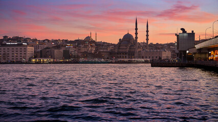 15th of March, 2023, Turkey, Istanbul. View on the Galata bridge and Suleymaniye mosque at sunset