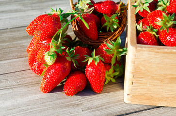 strawberries on wooden background