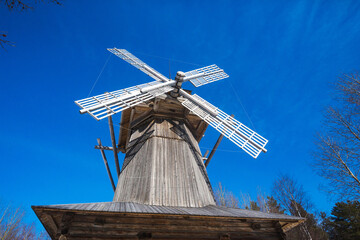 Wooden windmill in Malye Korely architecture museum, Arkhangelsk region, Russia