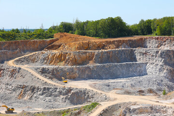 a quarry, in the photo a quarry and a blue sky in the background.