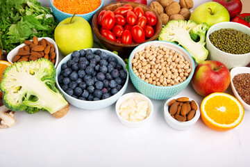 Fresh Ingredients for Dietary, Vegetables, Fruits, Nuts, Meat for Weight Loss on White Background