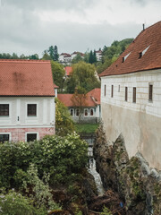 Fototapeta na wymiar Cesky Krumlov. Old houses with stone wall. Czech Republic