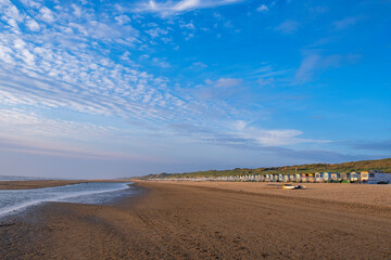 Walk in the evening on the beach of the Dutch North Sea near Egmond aan Zee/NL