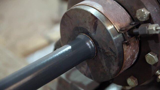 Pipe manufacturing plant. Pipe plant. Iron pipe welding. Pipe expansion. Sparks of welding. Tap. Factory. Machine tools. Production. Heavy industry.