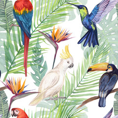 Watercolor seamless pattern with tropical birds and greenery. Illustration of cockatoo parrot, macaw parrot, hummingbird and toucan. Print with wild tropical nature and exotic birds. © Yana