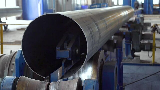 Pipe manufacturing plant. Metal Tube. Machine tools. Production. Heavy industry.