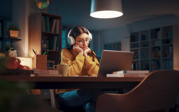 Woman Watching Videos Online At Home