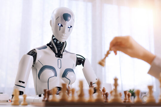 Fun and games: boy matches wits with robot